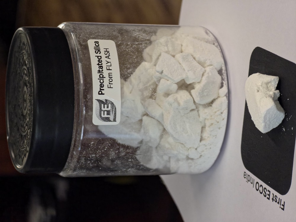 Precipitated silica recovered from fly ash, in a labelled specimen jar