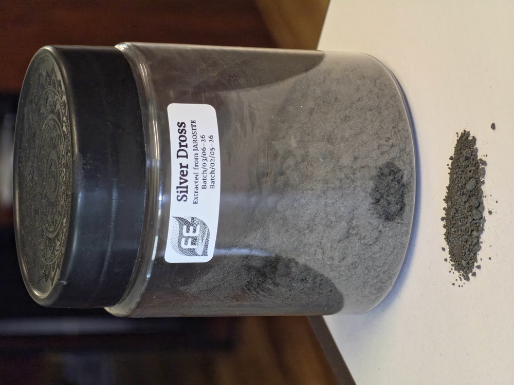 Silver dross recovered from jarosite, in a labelled specimen jar